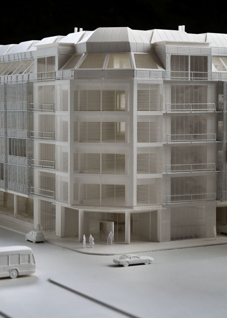 Street level view of white architectural model showing the entrance and facade of Grafton Way Building for University College London Hospitals used for town planning application